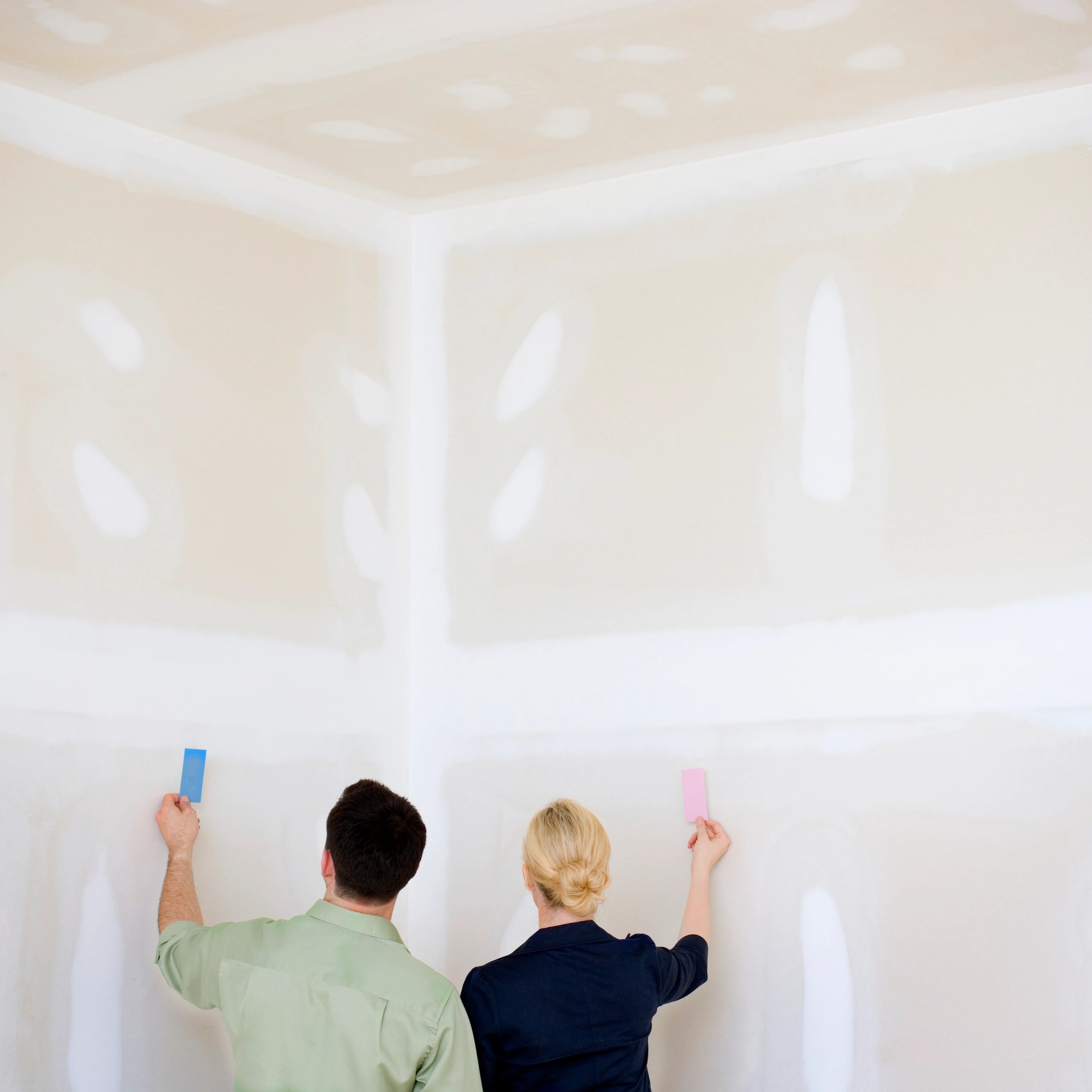 People comparing paint swatches